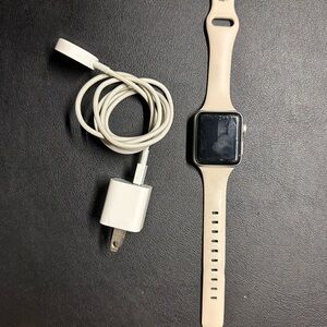 Series 3 Apple Watch with Cream Band and Charger
